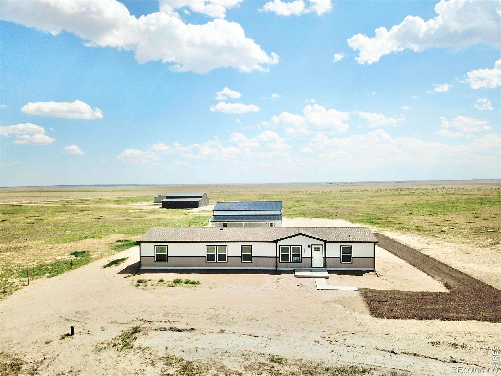 8.23 Acres of Land with Home for Sale in Briggsdale, Colorado