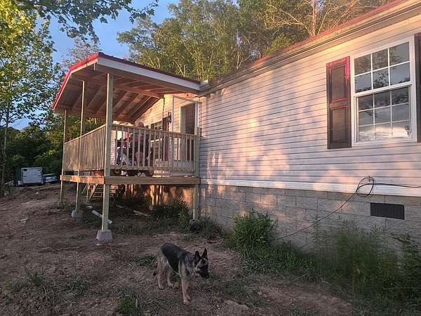 13.1 Acres of Land with Home for Sale in Louisa, Kentucky