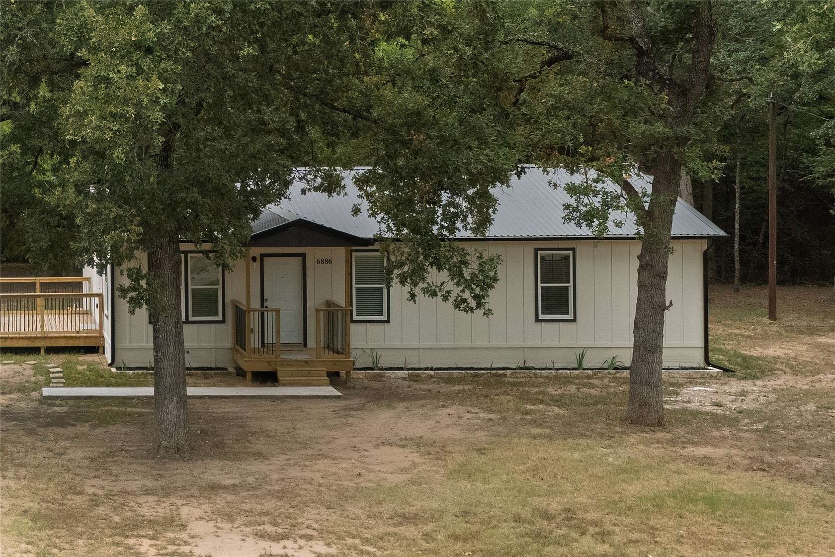 5.89 Acres of Land with Home for Sale in Quinlan, Texas