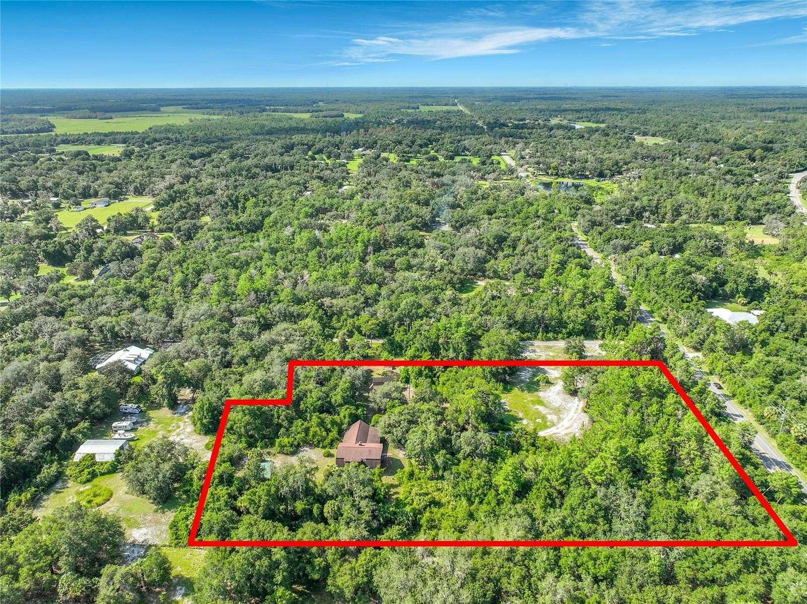 5.29 Acres of Land with Home for Sale in Geneva, Florida