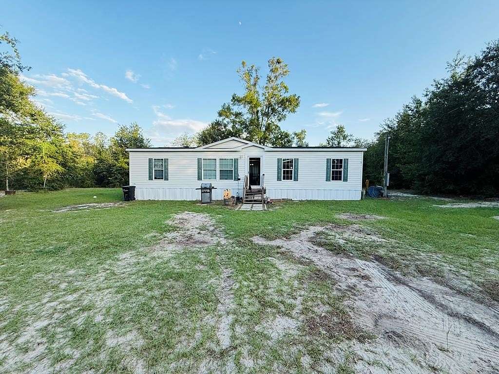 9.63 Acres of Land with Home for Sale in Bell, Florida