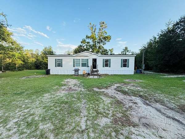 9.63 Acres of Land with Home for Sale in Bell, Florida