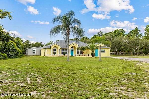 2 Acres of Land with Home for Sale in Cocoa, Florida