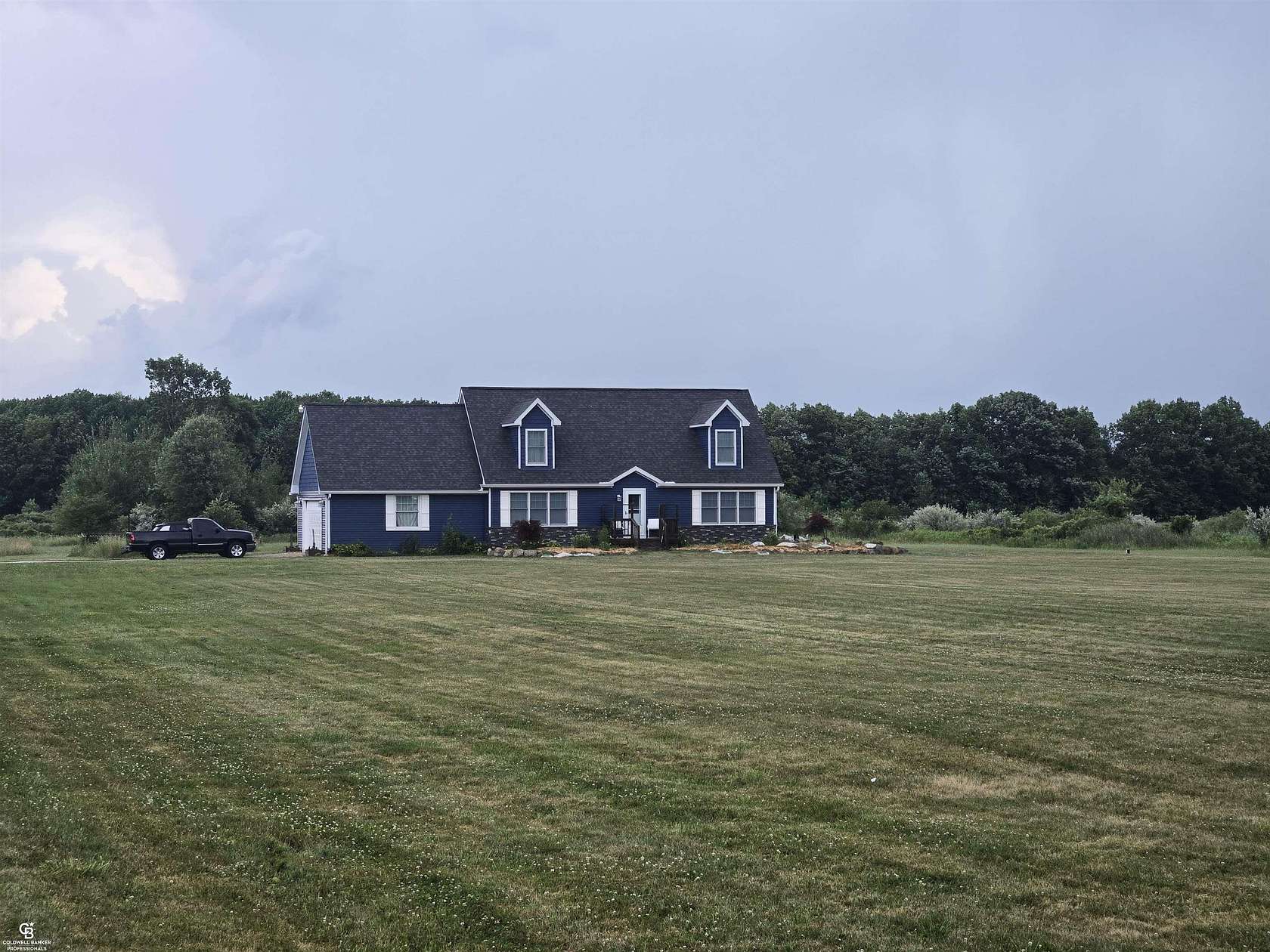 10 Acres of Land with Home for Sale in Emmett, Michigan
