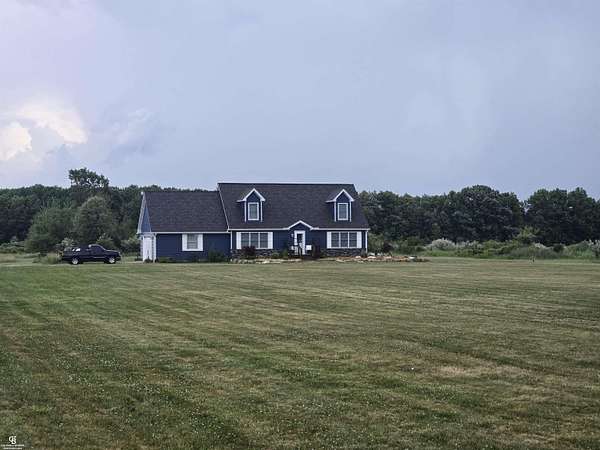 10 Acres of Land with Home for Sale in Emmett, Michigan