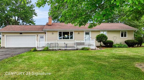 1.5 Acres of Land with Home for Sale in Corunna, Michigan