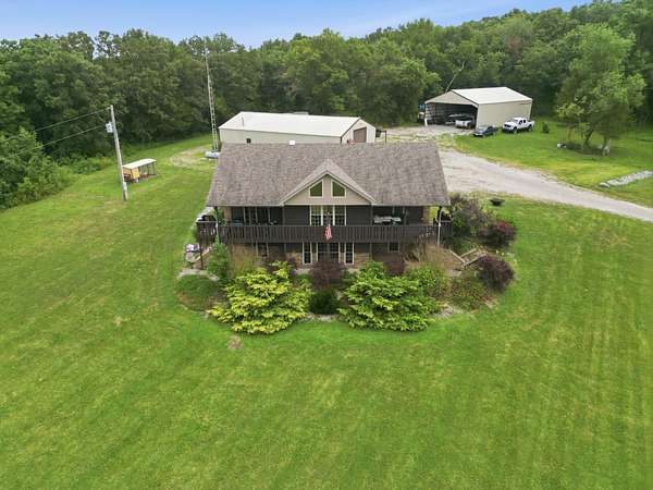 9.3 Acres of Land with Home for Sale in Wheatland, Missouri