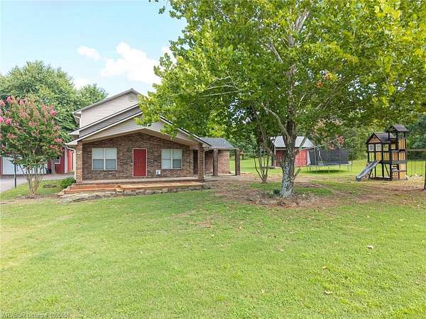 5.69 Acres of Land with Home for Sale in Hackett, Arkansas