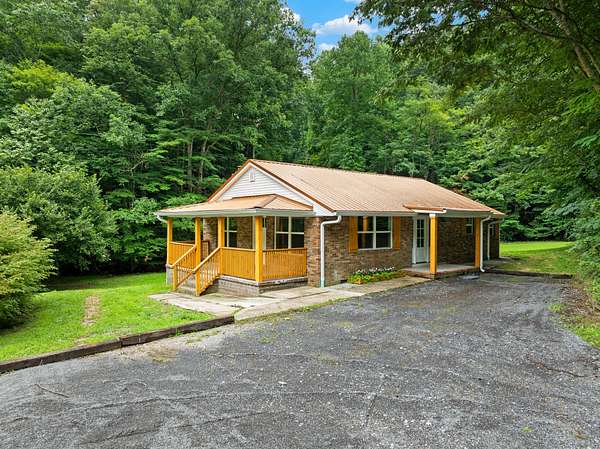 10.4 Acres of Recreational Land with Home for Sale in Rogersville, Tennessee