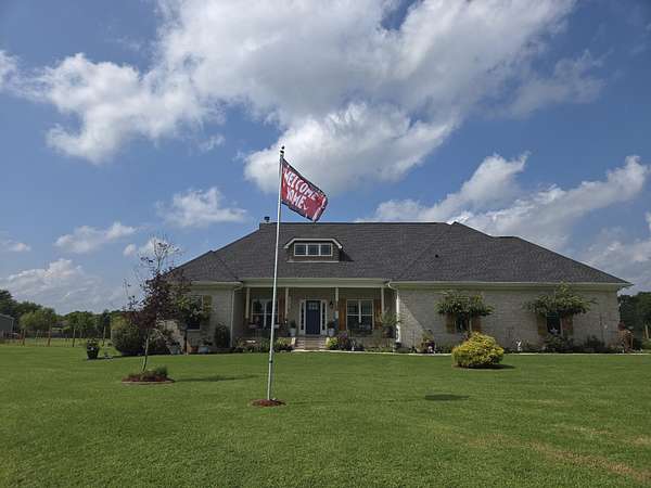 6.37 Acres of Land with Home for Sale in Castalian Springs, Tennessee