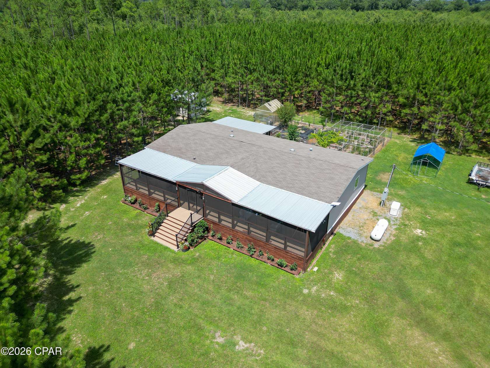 8.47 Acres of Land with Home for Sale in Greenwood, Florida