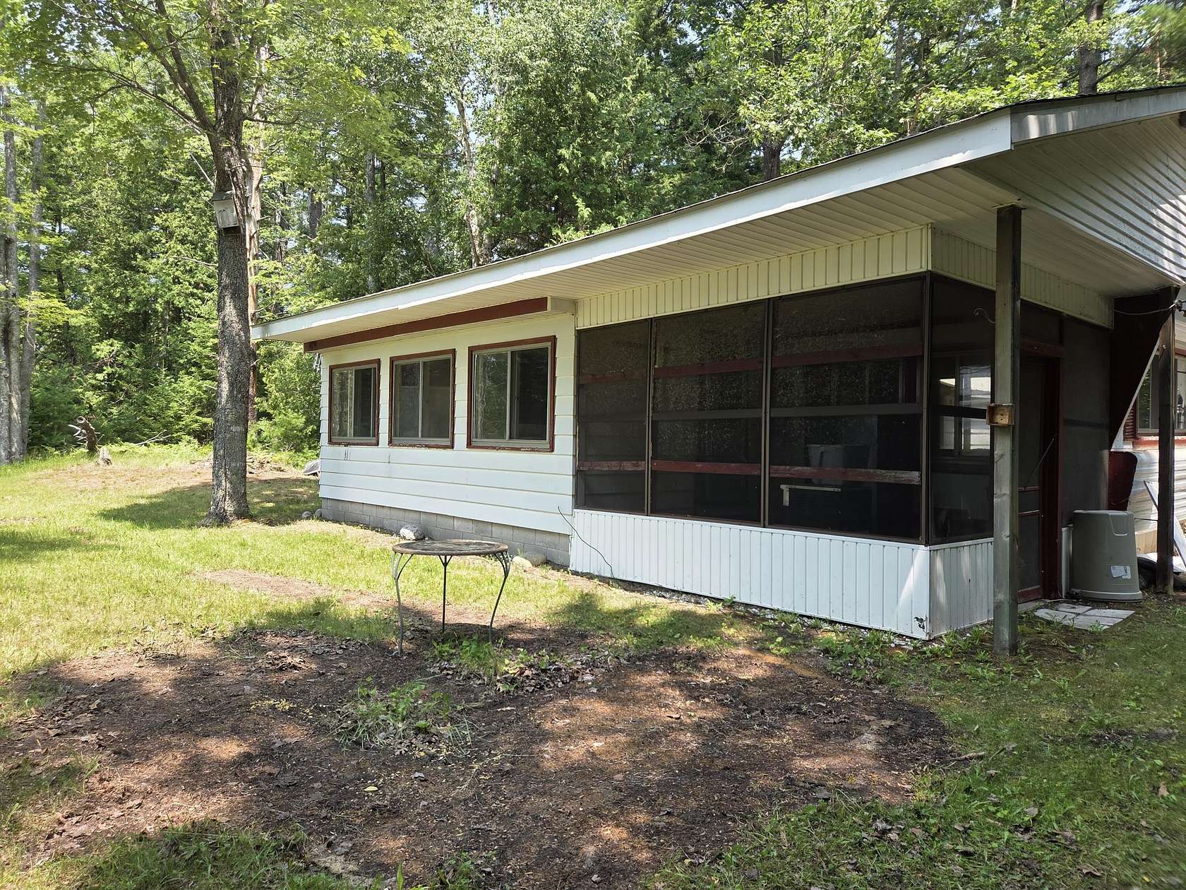 10.3 Acres of Recreational Land with Home for Sale in Millersburg, Michigan
