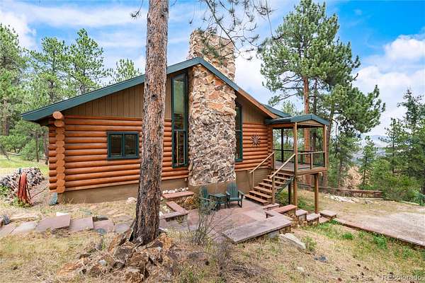 17 Acres of Land with Home for Sale in Evergreen, Colorado