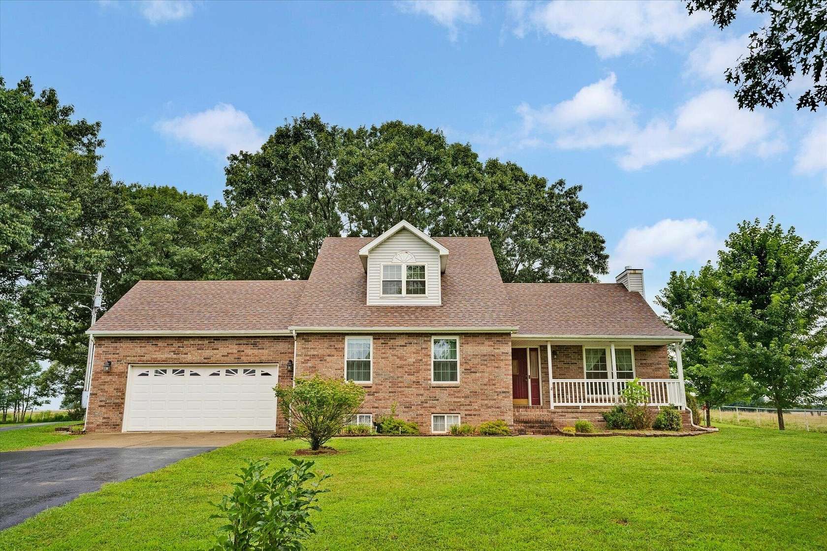 4.86 Acres of Land with Home for Sale in Halfway, Missouri