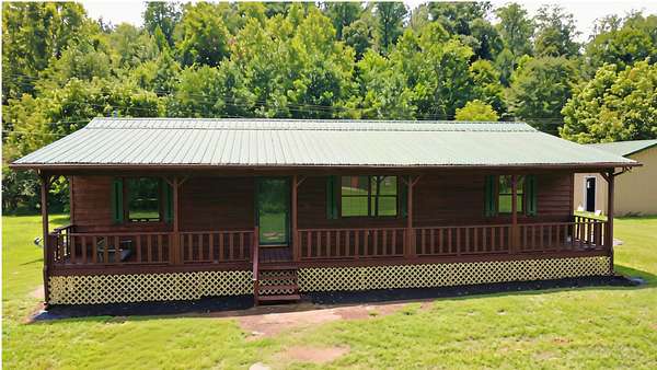 4.25 Acres of Land with Home for Sale in McDonald, Tennessee