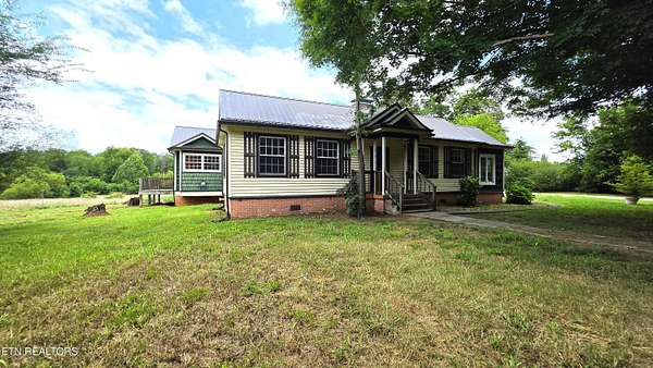12.4 Acres of Land with Home for Sale in Riceville, Tennessee