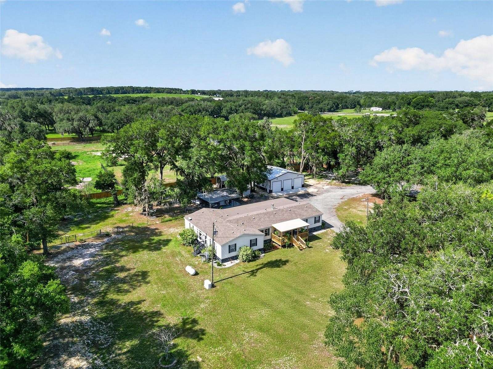 5 Acres of Land with Home for Sale in Weirsdale, Florida