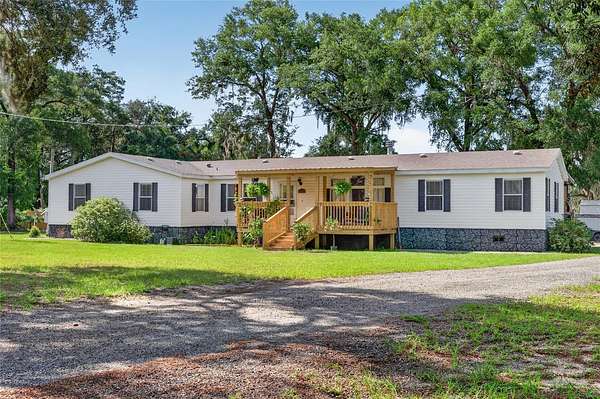 5 Acres of Land with Home for Sale in Weirsdale, Florida
