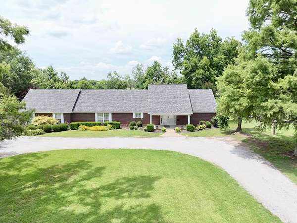 1.87 Acres of Land with Home for Sale in New Albany, Mississippi