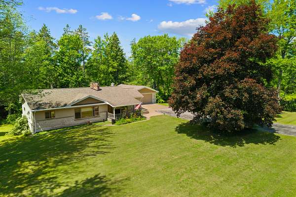 5 Acres of Land with Home for Sale in Fairview, Michigan