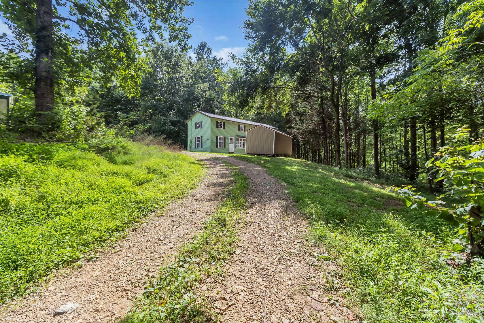 1.55 Acres of Land with Home for Sale in Westmoreland, Tennessee