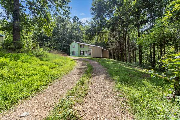 1.55 Acres of Land with Home for Sale in Westmoreland, Tennessee