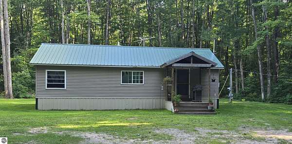 4.78 Acres of Land with Home for Sale in Alden, Michigan