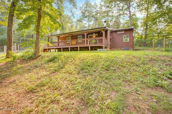 9.8 Acres of Land with Home for Sale in Parrottsville, Tennessee