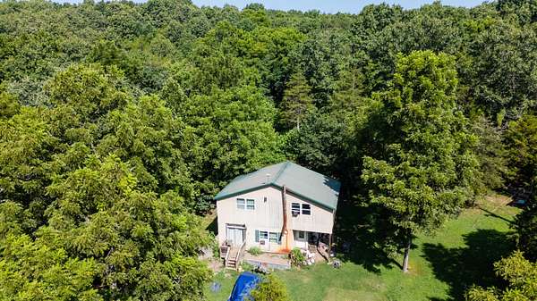 136 Acres of Land with Home for Sale in Squires, Missouri