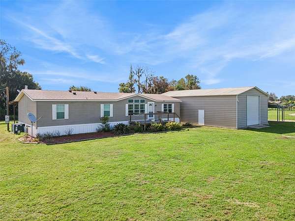 5 Acres of Land with Home for Sale in Fort Meade, Florida