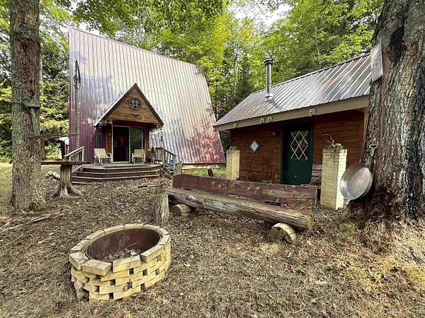 16 Acres of Recreational Land with Home for Sale in Gulliver, Michigan