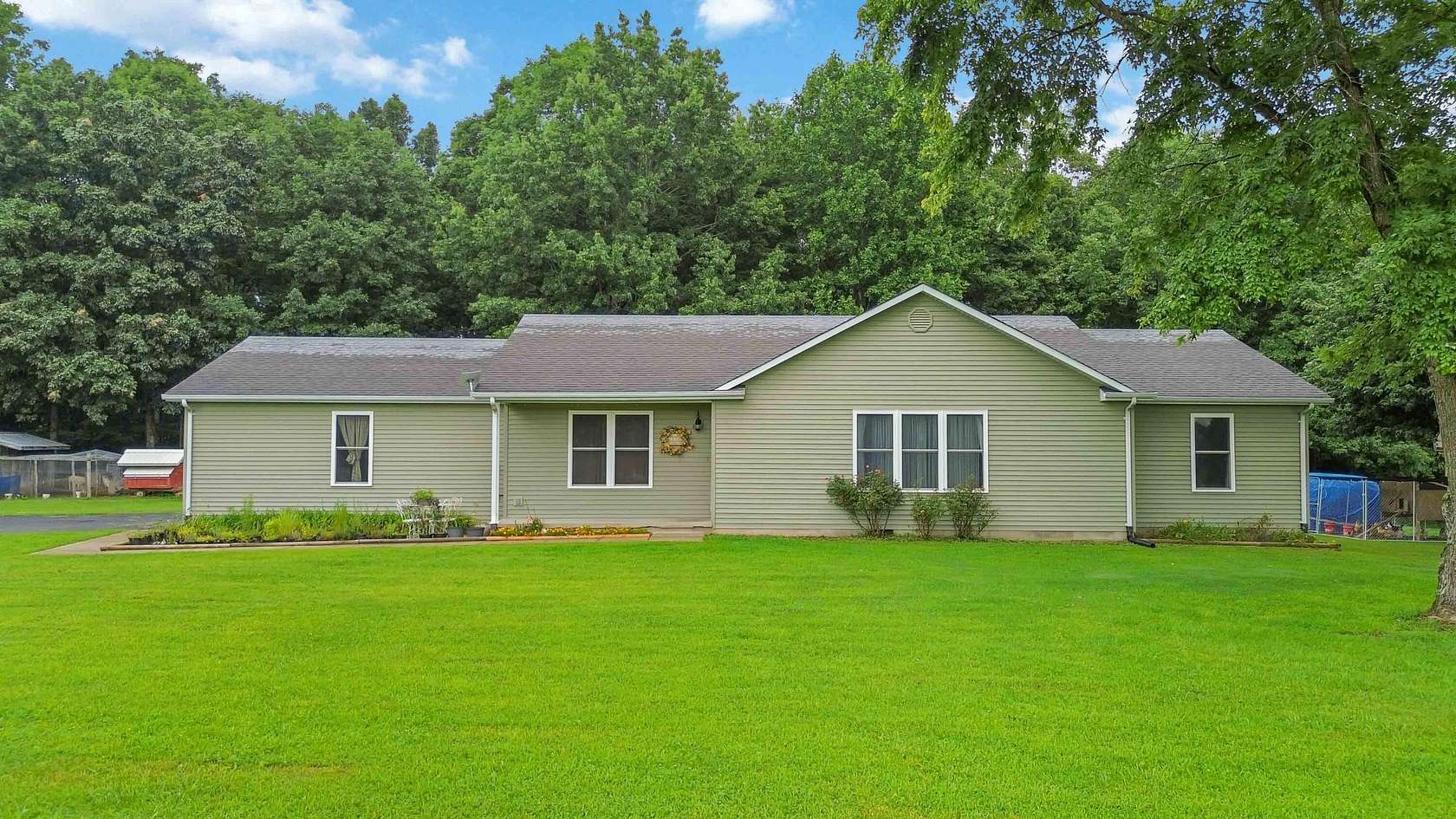 33.8 Acres of Land with Home for Sale in Liberty, Kentucky