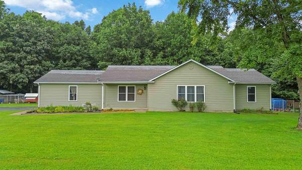 33.8 Acres of Land with Home for Sale in Liberty, Kentucky