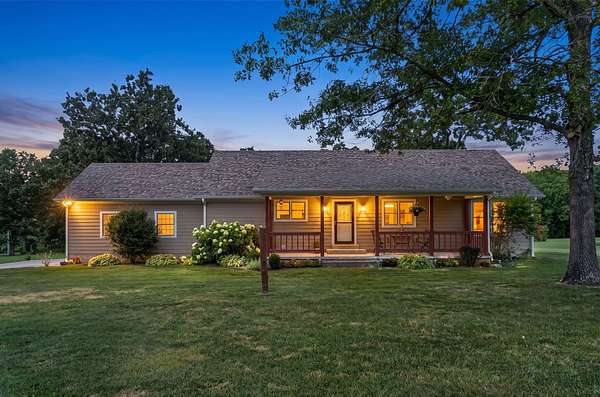 15 Acres of Land with Home for Sale in Wheatland, Missouri