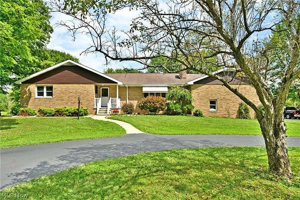 71.9 Acres of Land with Home for Sale in Farmdale, Ohio