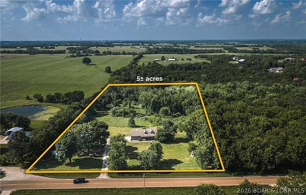 4.5 Acres of Land with Home for Sale in Eldon, Missouri