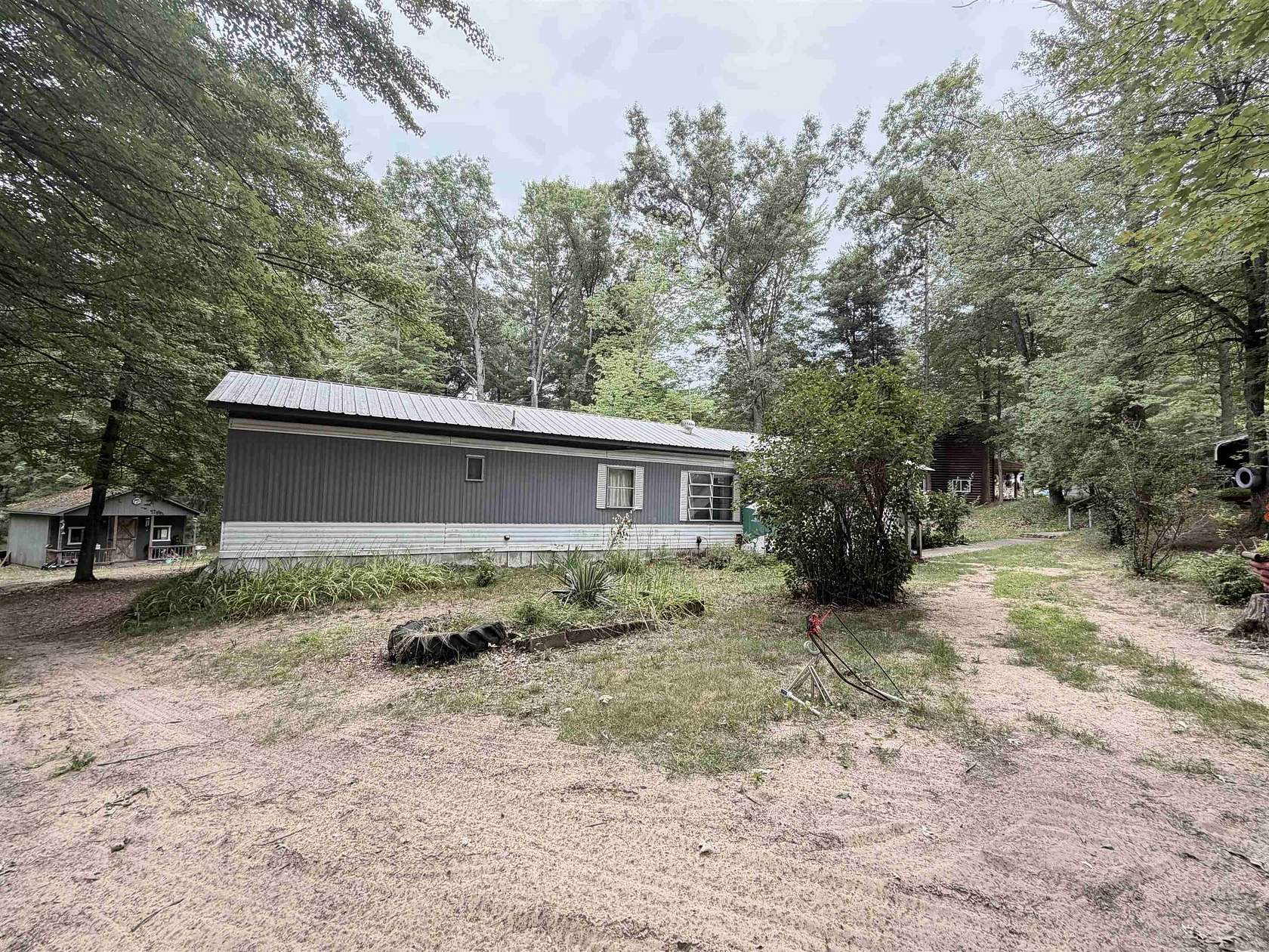 1.6 Acres of Land with Home for Sale in Harrison, Michigan