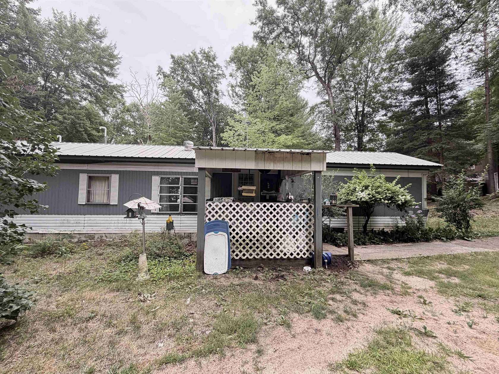 1.6 Acres of Land with Home for Sale in Harrison, Michigan