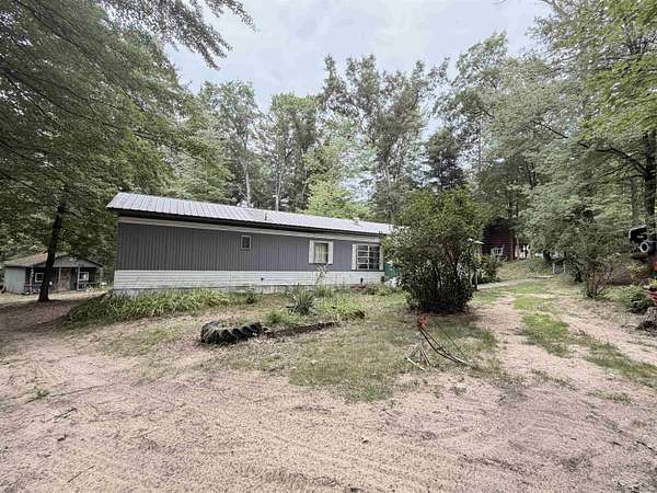 1.6 Acres of Land with Home for Sale in Harrison, Michigan