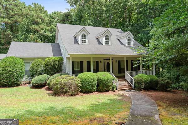 6.6 Acres of Land with Home for Sale in Hampton, Georgia