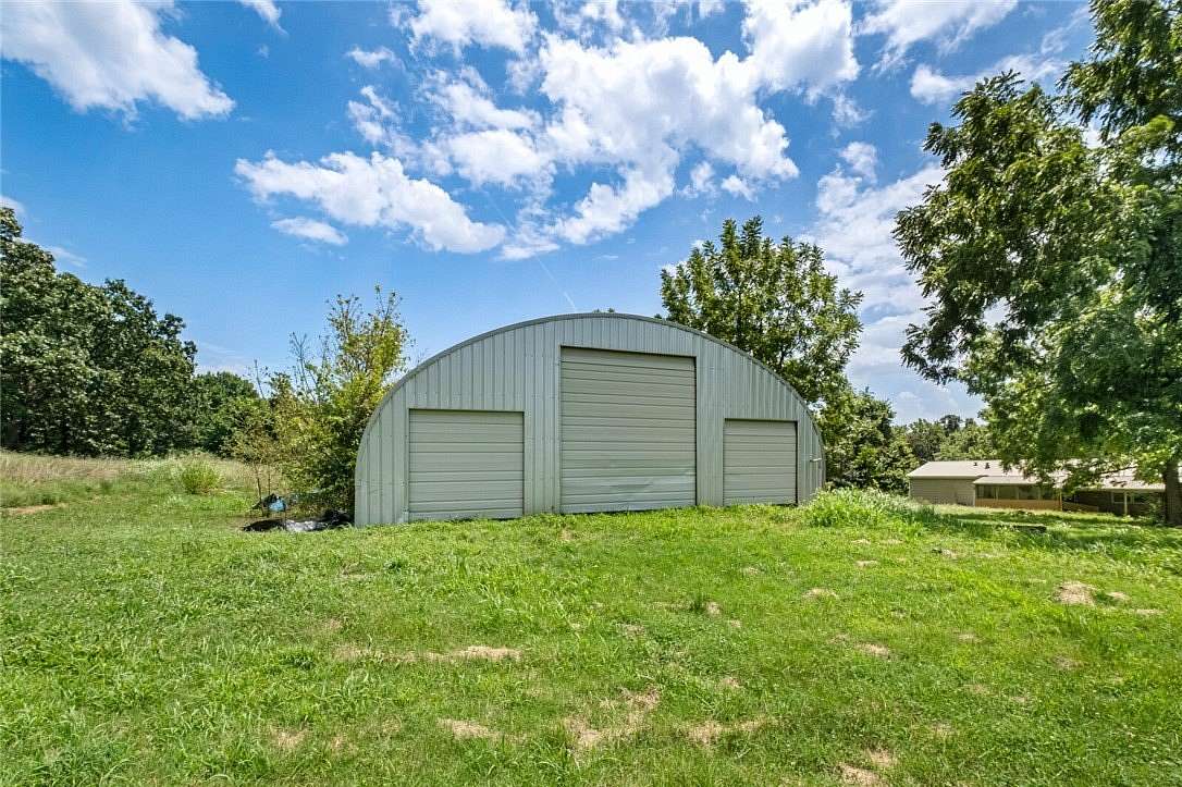 1 Acre of Residential Land for Sale in Cave Springs, Arkansas