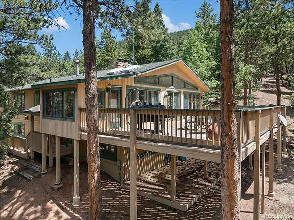 5 Acres of Land with Home for Sale in Woodland Park, Colorado