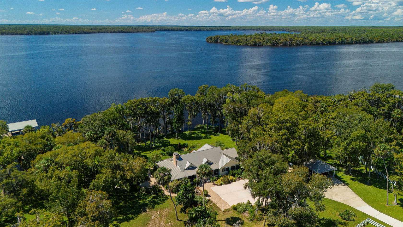 21.8 Acres of Land with Home for Sale in Crescent City, Florida