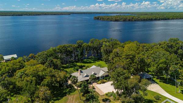 21.8 Acres of Land with Home for Sale in Crescent City, Florida