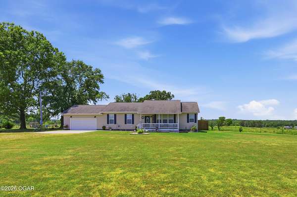 20.4 Acres of Agricultural Land with Home for Sale in Seneca, Missouri