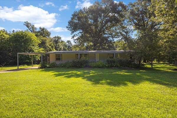 6 Acres of Land with Home for Sale in Avinger, Texas