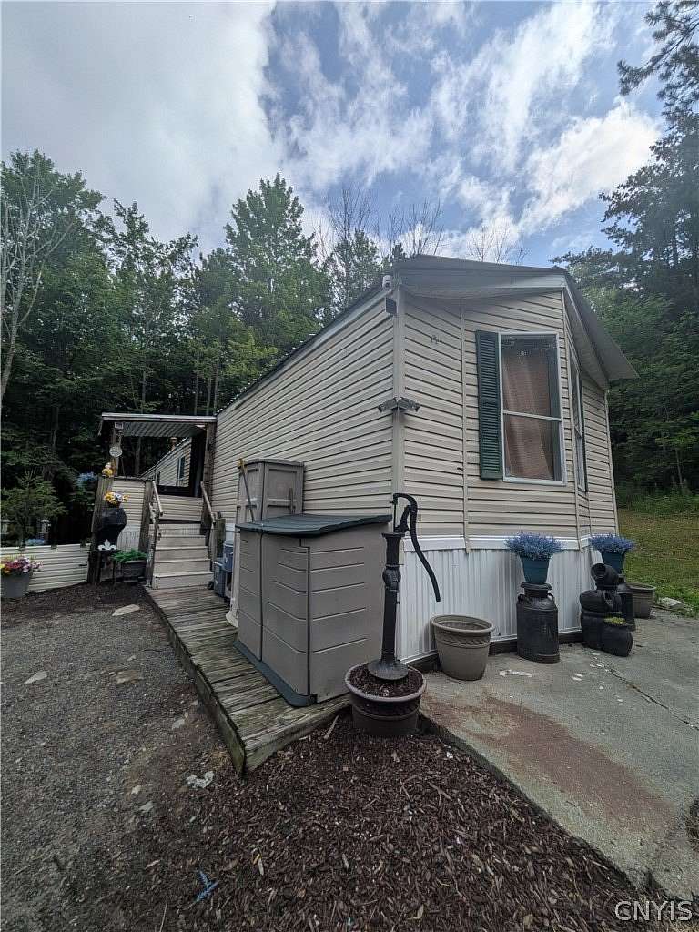 8 Acres of Land with Home for Sale in Newfield, New York