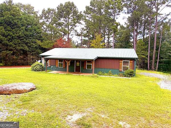 6.54 Acres of Land with Home for Sale in Jackson, Georgia