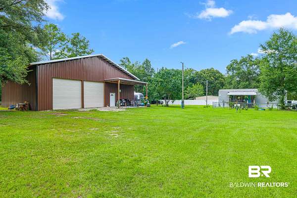 1.26 Acres of Land with Home for Sale in Robertsdale, Alabama