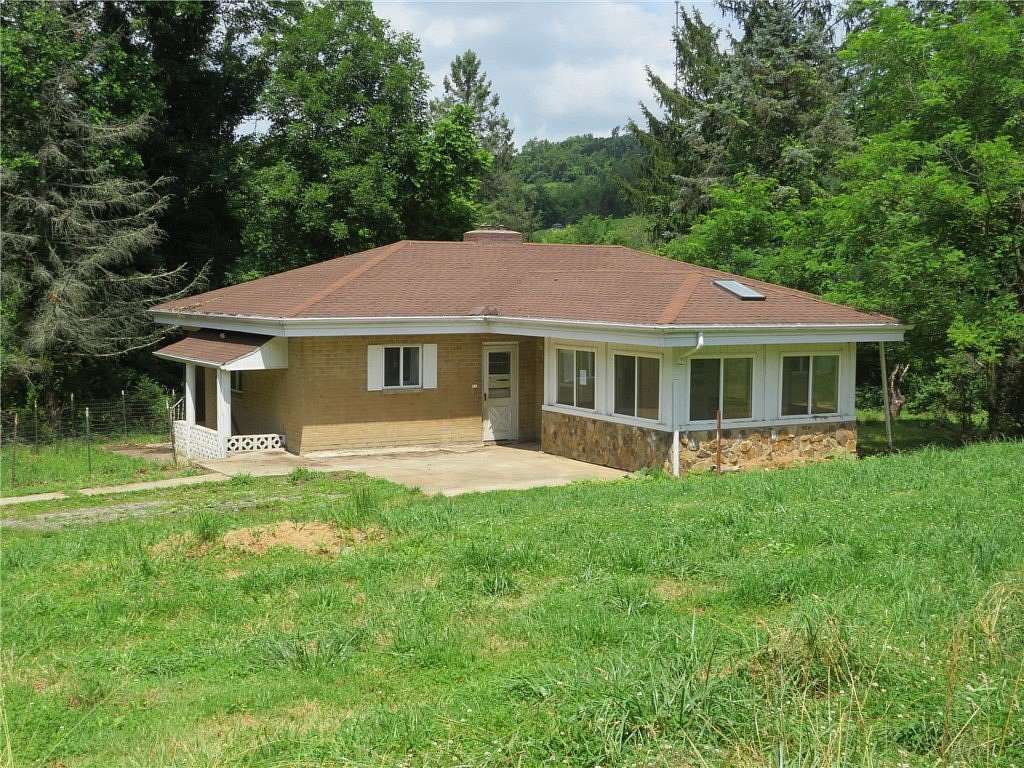 39.4 Acres of Land with Home for Sale in Smock, Pennsylvania